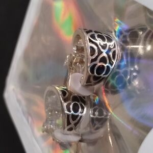 Vintage black enamel clip on earrings